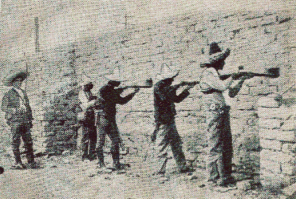 Rebel soldiers firing from an adobe fort.